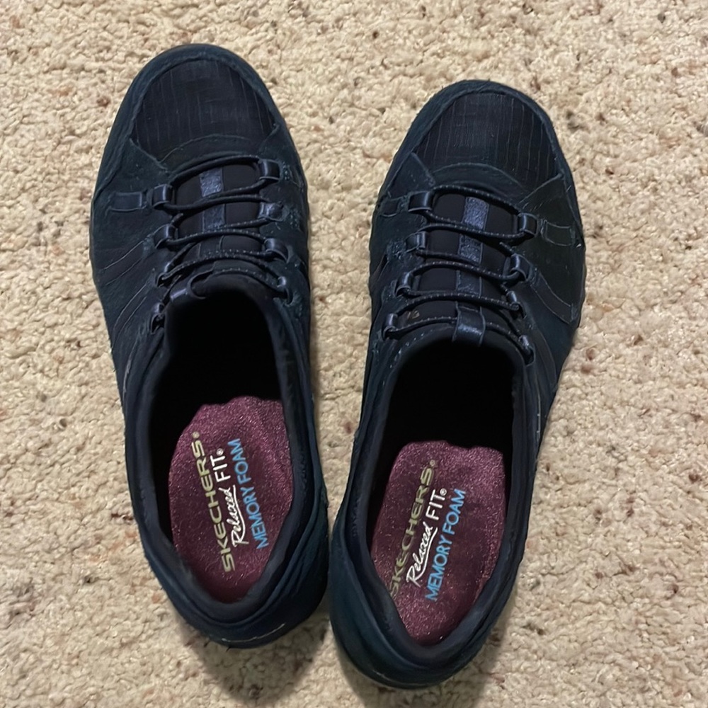 Navy slip on Skechers. NWOT